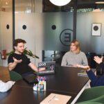 Content team discussing how to create content that converts