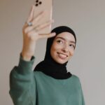 woman influencer taking a video of herself