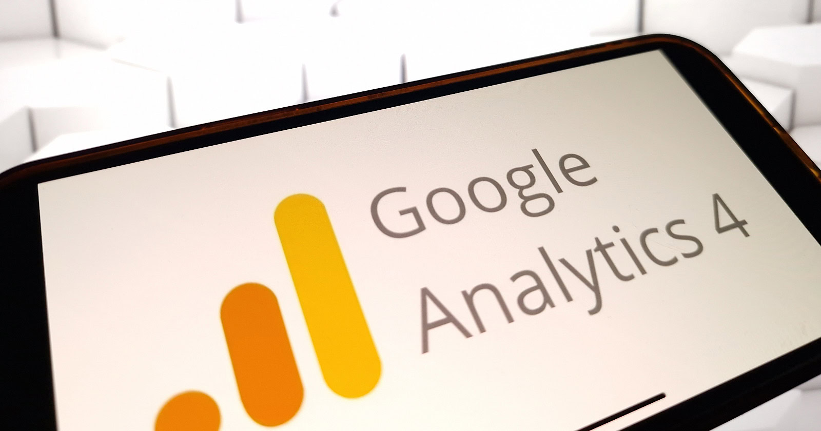 Google Analytics 4 logo displayed on mobile phone screen